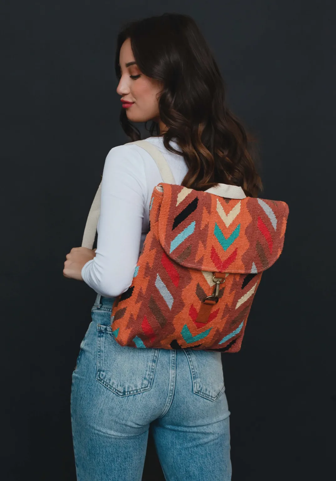 orange multi woven backpack